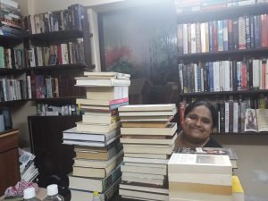 Fiza Pathan with a few of her books