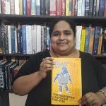 Fiza Pathan posing with the book No Laughing Matter